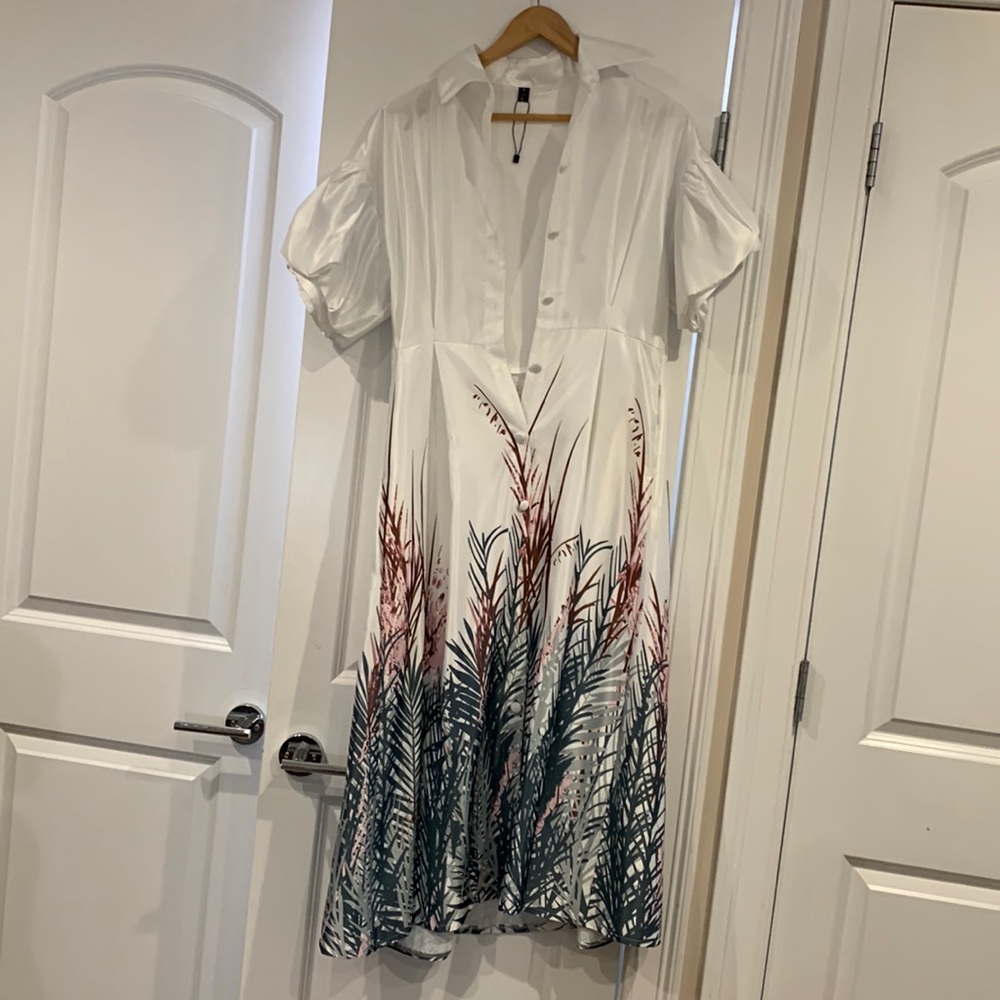 Brand new gorgeous dress size small by Nancy never worn